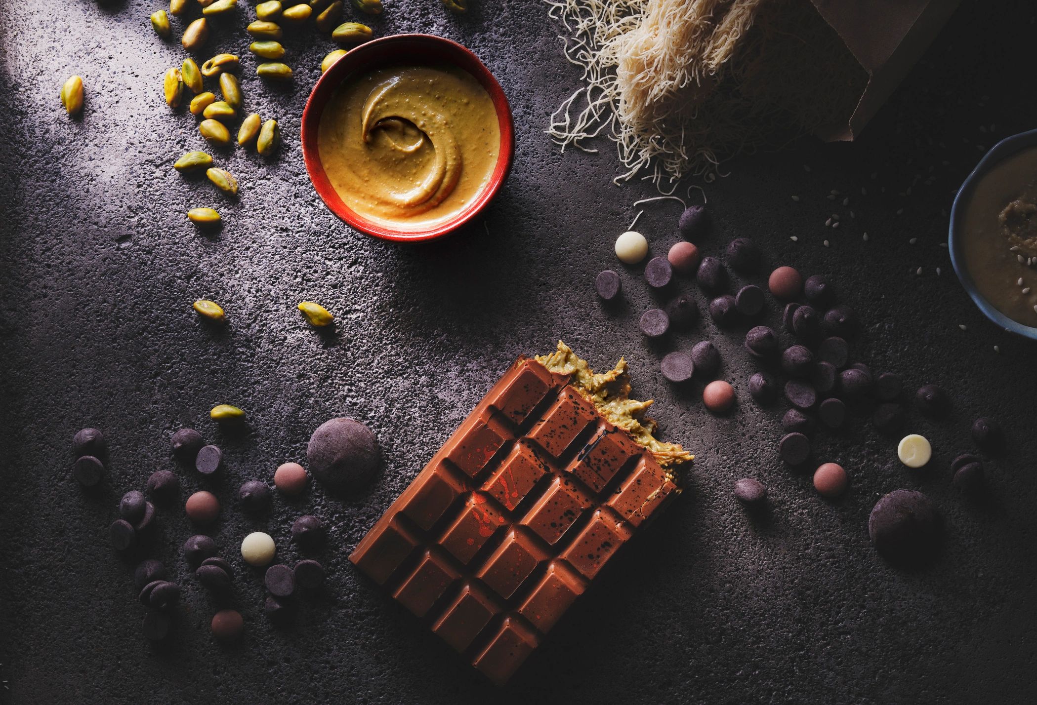 Chocolate bar with ingredients styled for product photography